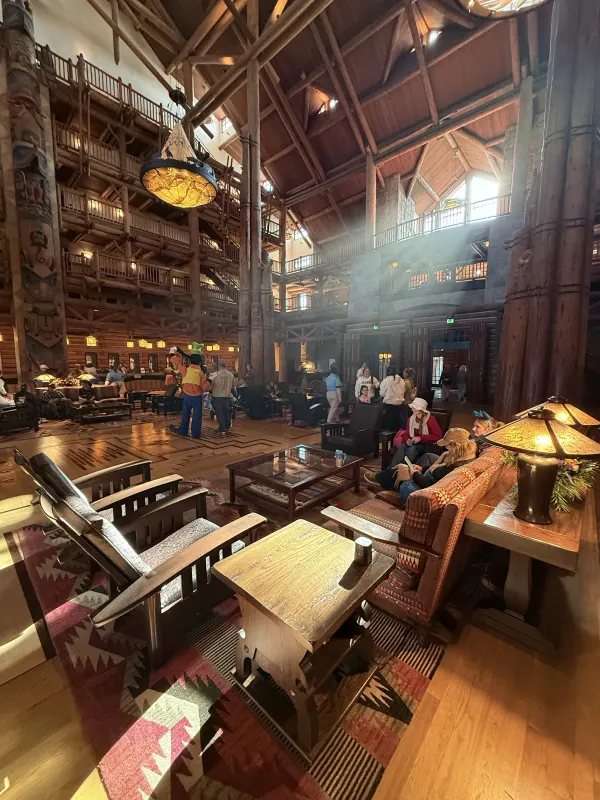 Mid-afternoon in the great room — guests gather in the lobby between activities; the lodge doubles as the resort's hub.