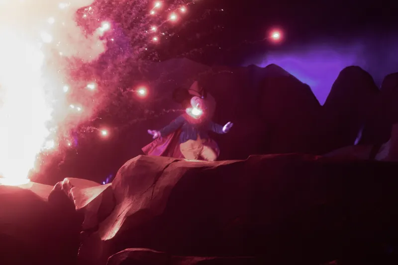 Sorcerer Mickey atop the mountain — one of the show's signature tableaux.