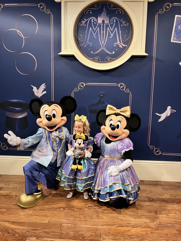Mickey and Minnie in their 50th-anniversary regalia at Town Square Theater — the character meet a few steps from Tony's front door on Main Street.