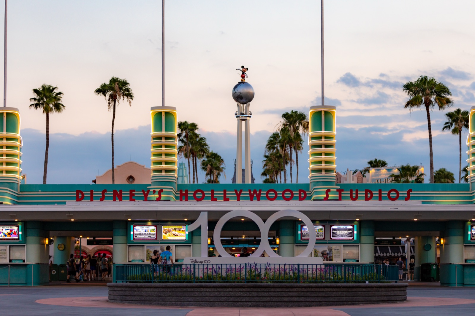 Disney's Hollywood Studios entrance arch at golden hour.
