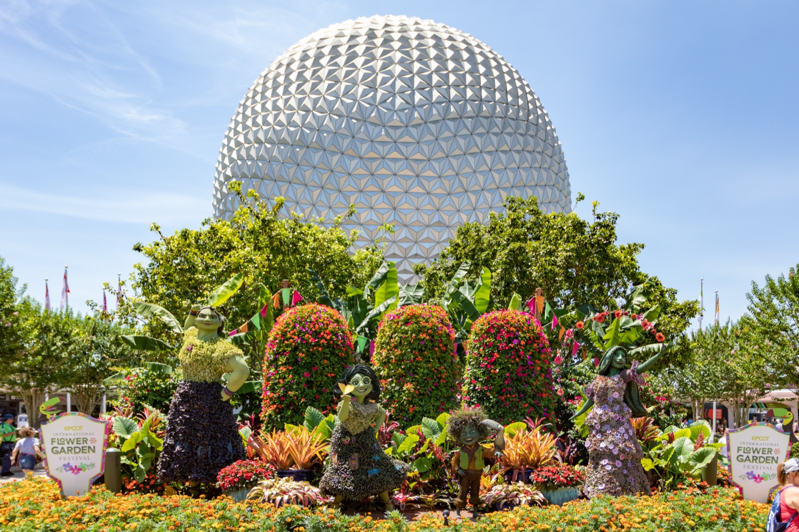 Spaceship Earth with Snow White & the Seven Dwarfs topiaries during EPCOT International Flower & Garden.